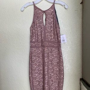 A new with tags taupe dress from David’s Bridal